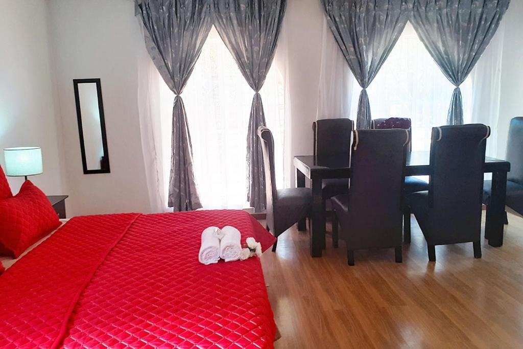 Queens Palace Pretoria-Noord Rom bilde